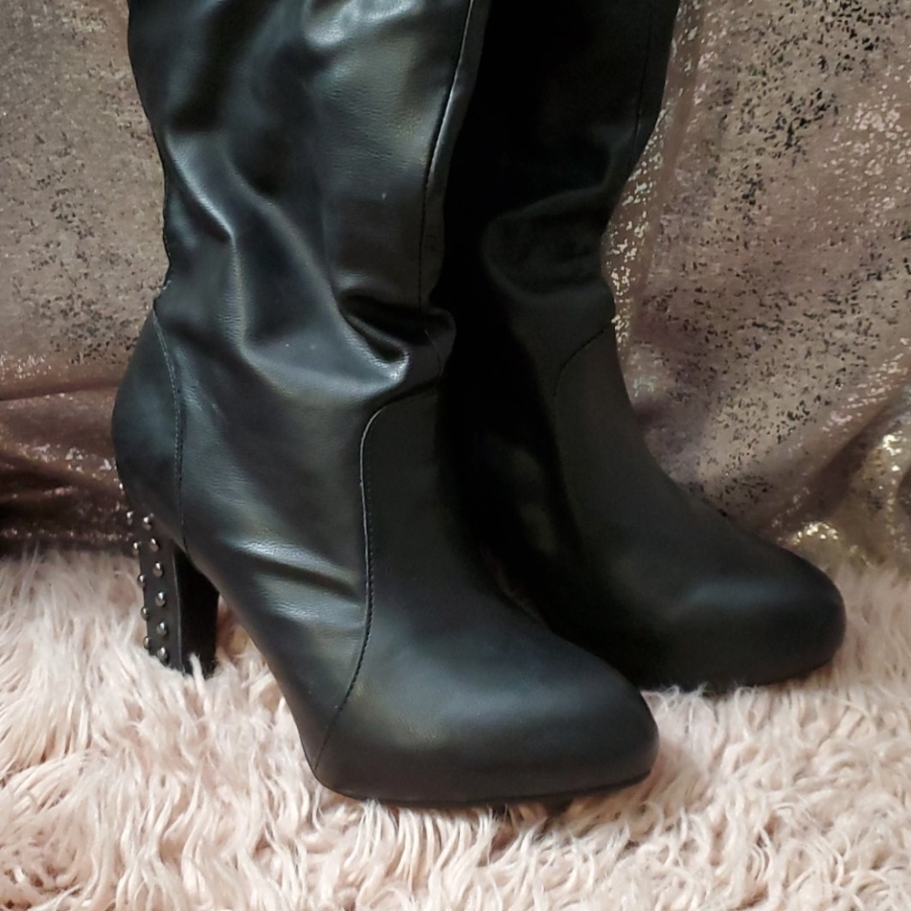 Black OTK boots with studded heels
